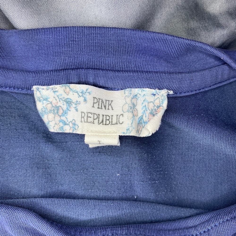 Pink republic blue shirt.